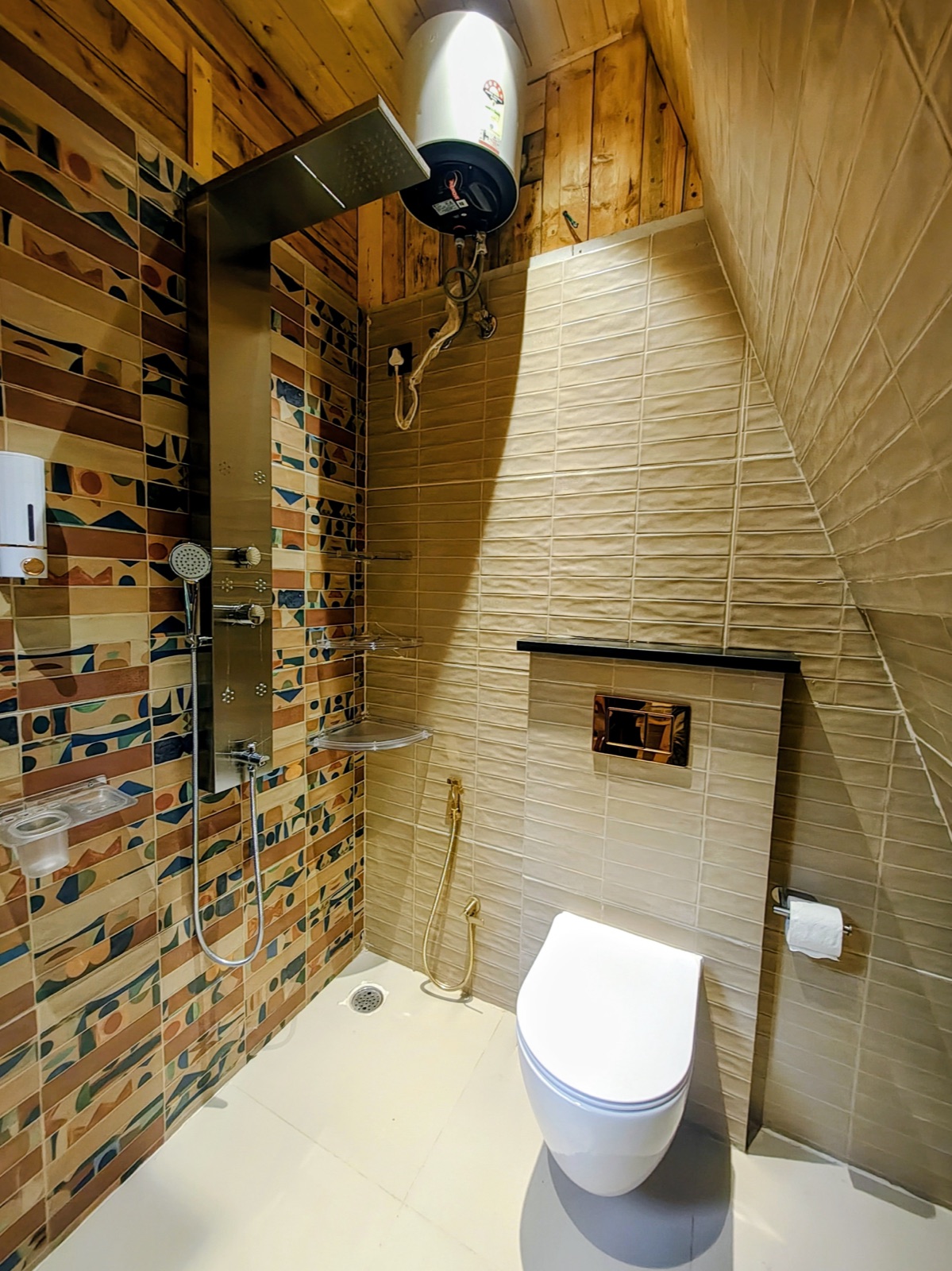 En-suite shower bathroom with a patterned mosaic feature wall