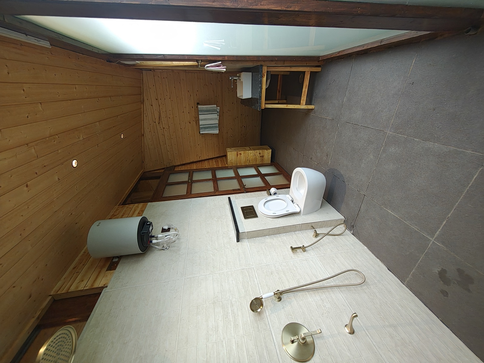 Spacious bathroom with a walk-in rain shower and vanity